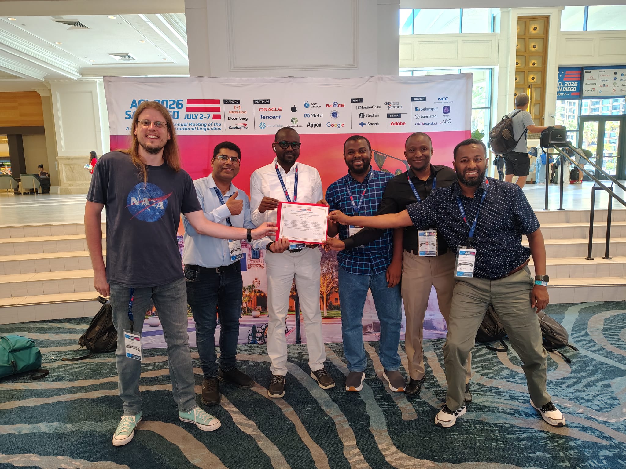 Dr Idris Abdulmumin and collaborators celebrating the POLAR EEUCA Best Paper Award at ACL 2026